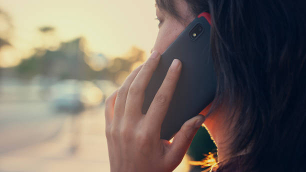 istock Woman talking on a cellphone 2171324309