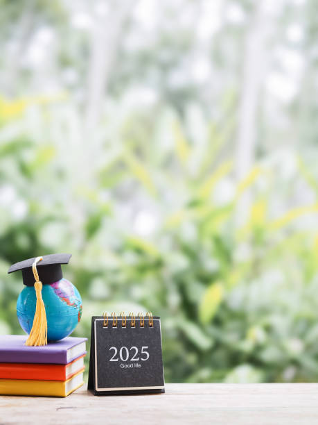 istock Student creative desktop, earth globe with graduation hat on hardcover book and 2024 desk calendar. Copy space for text, Back to school, Education concept 2171331633