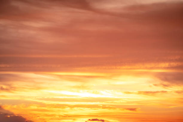 Beautiful , luxury soft gradient orange gold clouds and sunlight on the blue sky perfect for the background, take in everning,Twilight, Large size, high definition landscape photo