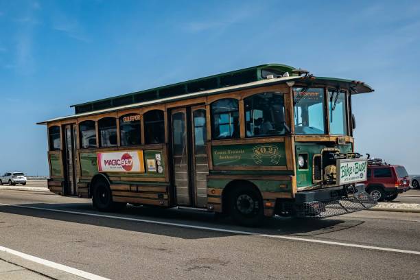 Gulfport, MS - October 04, 2023: Wide angle front corner view of a 2005 Optima AH-28 Trolley Bus at a local car show.
