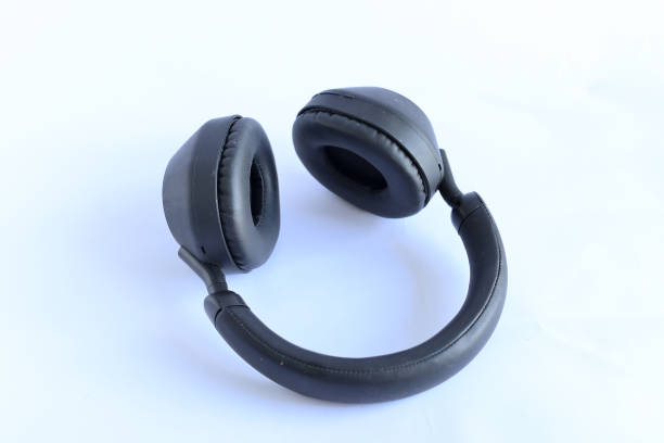 istock wireless overhead black headphones isolated on white background 2171340514