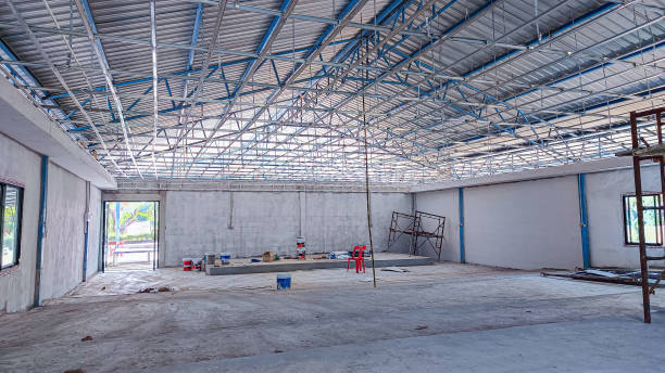 istock Ceiling installation with expert technicians In the room that is in the construction process. 2171341155