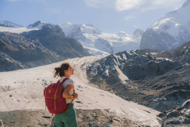 istock Woman exploring glacier in Swiss Alps 2171341211