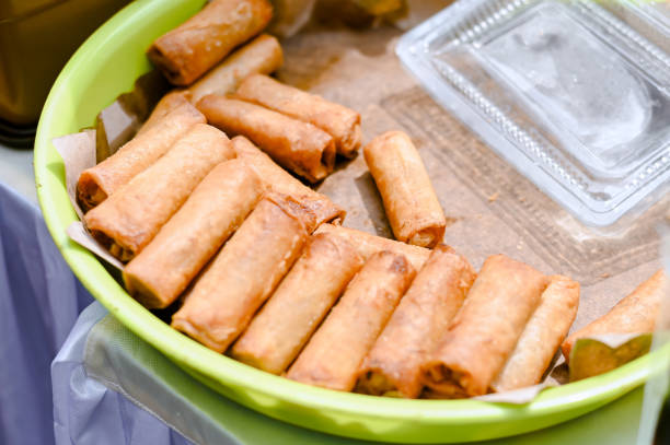 istock A plate of crispy, golden-brown spring rolls 2171341446