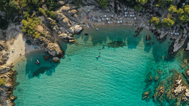istock A hidden beach cove where the turquoise waters meet the rugged cliffs 2171341812