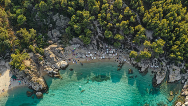 istock A hidden beach cove where the turquoise waters meet the rugged cliffs 2171341815