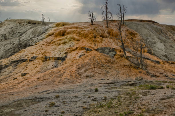 istock Mammoth, Hot Spring Terraces, Orange Spring Mound in Yellowstone National Park with beautiful landscape. Sinter terraces and hot springs. The smell, the colors, the sounds are a natural experience. 2171341914