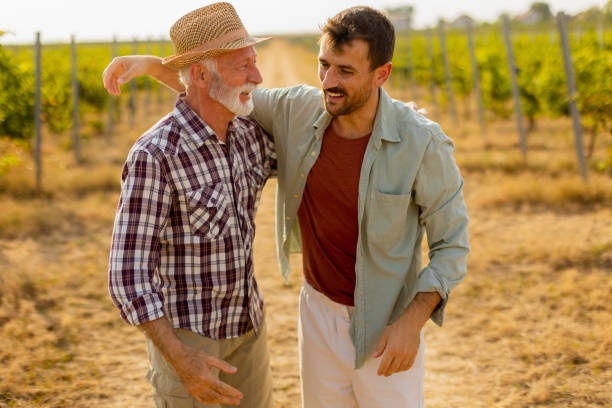 istock Joyful day spent in the vineyard, where generations connect through laughter and shared moments under the warm sun 2171343979