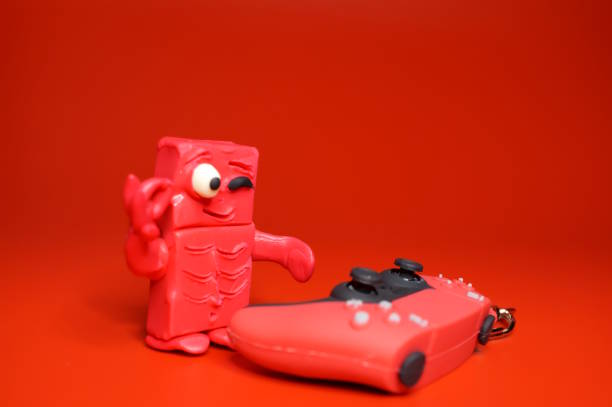 istock Funny toy zombie and toy game joystick. 2171345086