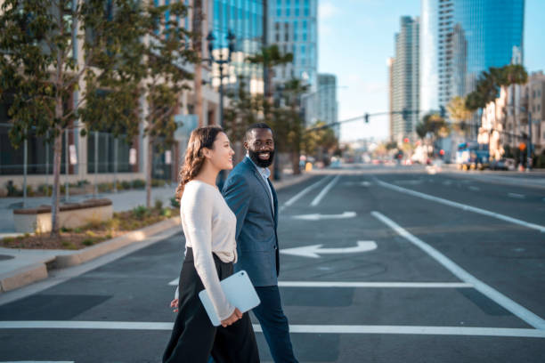 Confident Business Professionals Walking in San Diego
