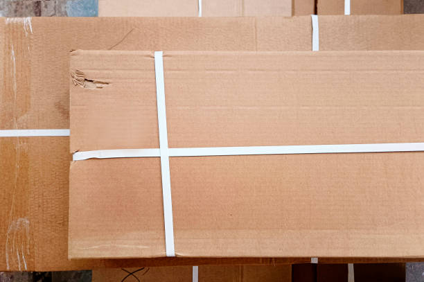istock Closed cardboard box taped up, Top view. 2171351886