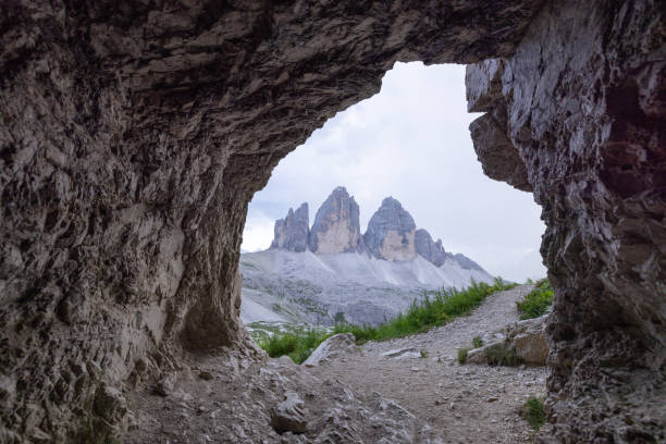 istock Mountain Peaks Viewed from Inside a Rocky Cave 2171353165