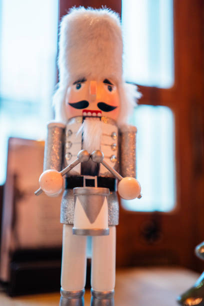 istock Decorative White Nutcracker With White Fur Bearskin Hat a Silver Costume and Drums 2171354442