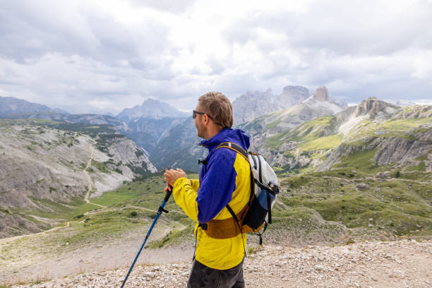 istock Hiker Admiring Mountain View on Rocky Trail 2171354990