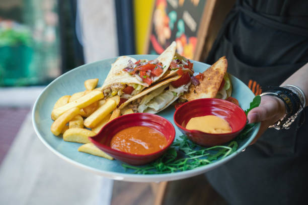 istock Quesadilla with pommes frites and sauce and arugula 2171358314