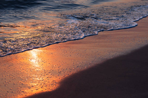 istock Natural background with shore water and shiny wet beach sand 2171360852