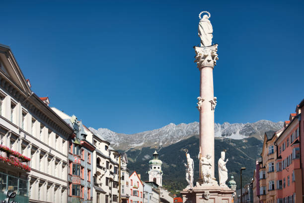 Maria Theresa Street with the St. Anne's Column (Annasaule) from 1706 in downtown Innsbruck Tyrol Austria.