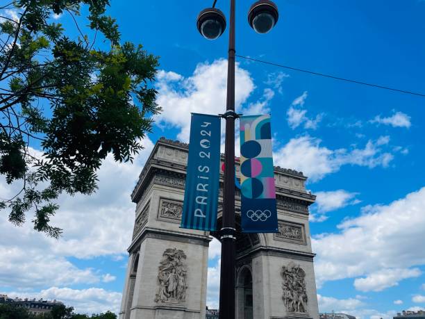This picture is taken at Paris, France in the summer of 2024. The Arc de Triomphe is an iconic symbol of French national identity and took 30 years to build.