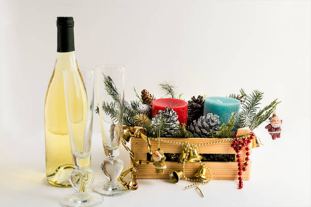 istock Christmas box with champagne glasses and candles 2171371264