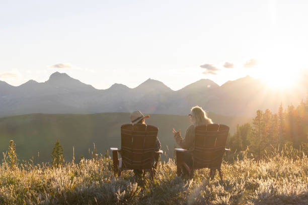 istock Mature women watch sunset over mountains 2171372166