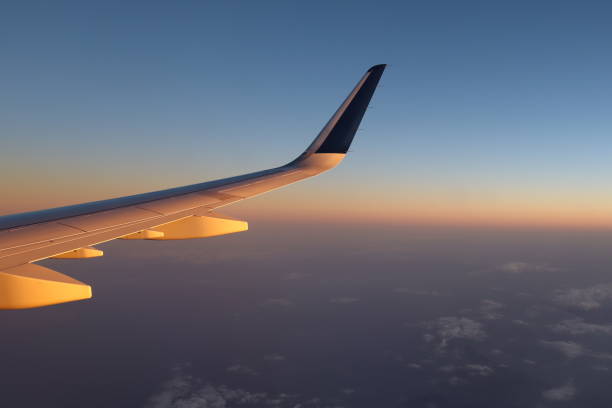 istock Beautiful orange and purple sunset from an airplane 2171373784