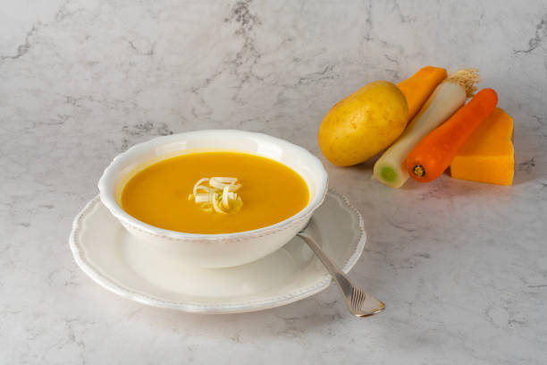 istock Pumpkin cream bowl with fresh ingredients. 2171377126