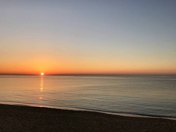 istock Serene Sunset Over Calm Waters 2171377560