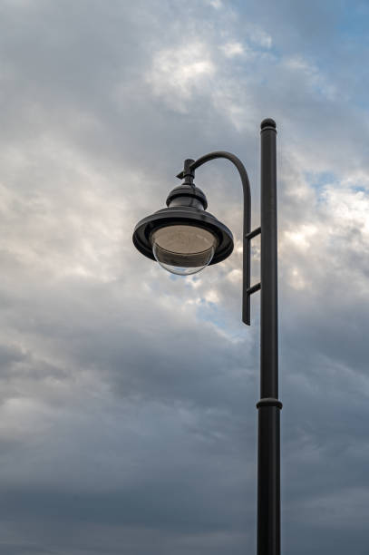 istock Street light on background of sunset cloudy sky. 2171377864