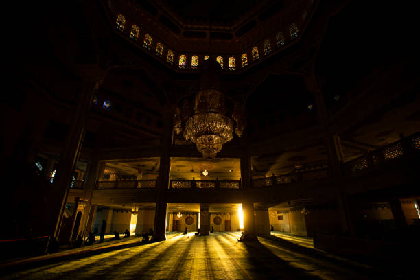 Bursa, Turkey - July 7, 2011: Men at different ages are praying in the Great Mosque