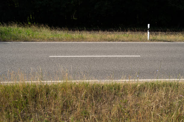 istock Paved road in the countryside 2171379752