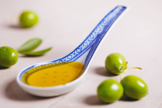 Culinary gray background with utensils, spices and towel. Cooking