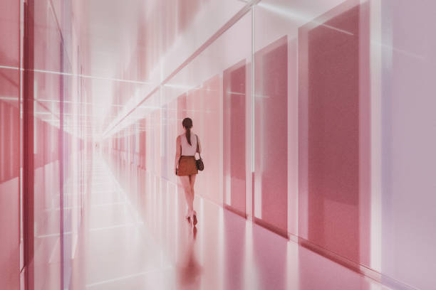 istock Woman walking in empty futuristic clean corridor 2171382309