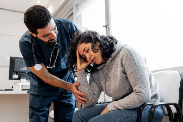 istock Doctor helping patient in a hospital 2171384586