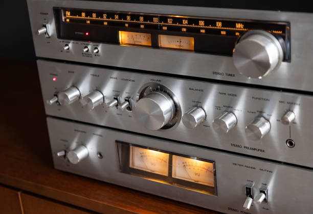 istock Vintage Audio Stereo Gear Separate Components System Setup, Tuner, pre-Amplifier, Power Amplifier. Metal Front Panel, Angled View Closeup 2171387774