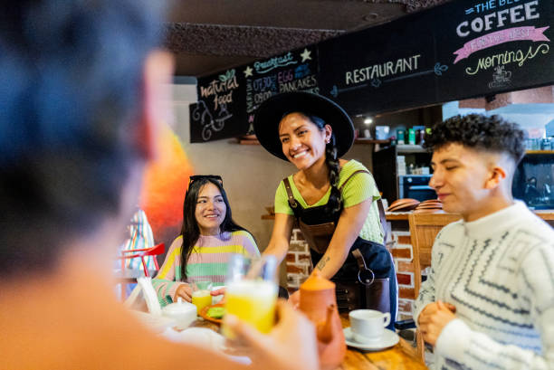 istock Waitress serving customers on a hotel restaurant 2171389280
