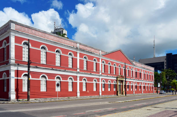 Recife, Pernambuco, Brazil: Ginásio Pernambucano is a public educational institution founded in 1825, occupies the current building since 1855. Recognized for its historical role in the state's education system, it is one of the oldest schools in Brazil. Over the years, it has educated many important Brazilian figures and has become a symbol of quality education in the country's northeast. Ginásio Pernambucano offers elementary and high school education, focusing on a well-rounded humanistic, scientific, and cultural formation. Red façade with greek fret / greek key / meander pattern on the frieze.