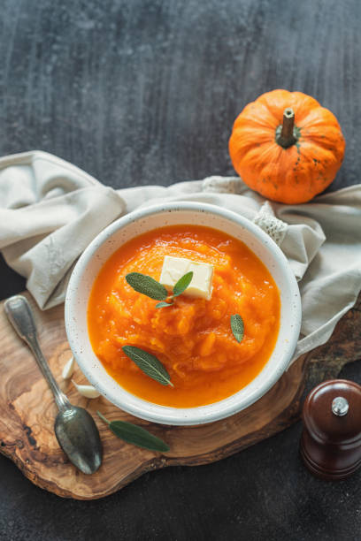 istock Homemade pumpkin cream soup with sage 2171392878