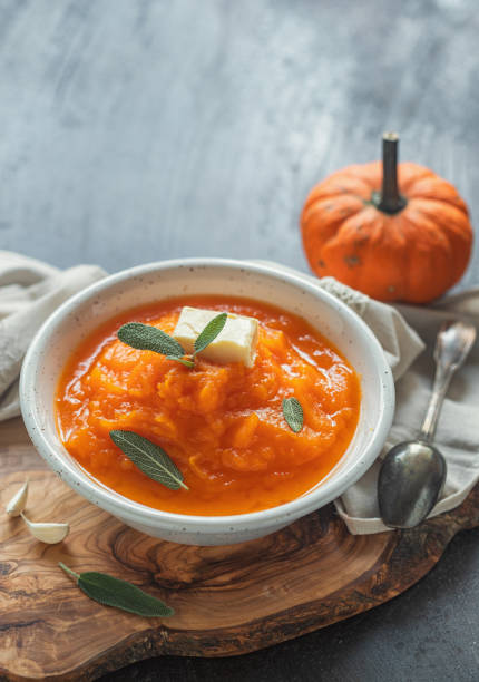 istock Homemade pumpkin cream soup with sage 2171392887