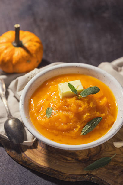 istock Homemade pumpkin cream soup with sage 2171392890