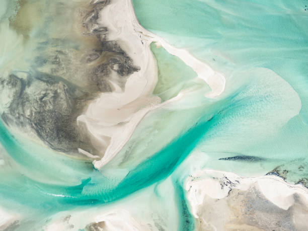 istock Aerial view of sand and water patterns 2171393286