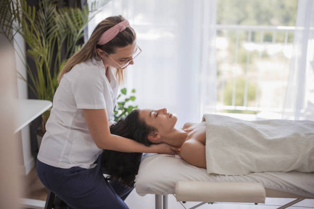 istock Woman enjoying a neck massage 2171400984