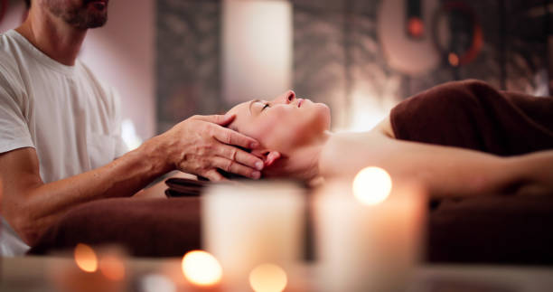 Young Woman Receiving Head Massage