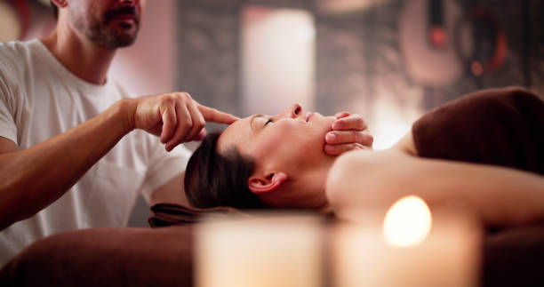 istock Young Woman Receiving Forehead Massage 2171402584