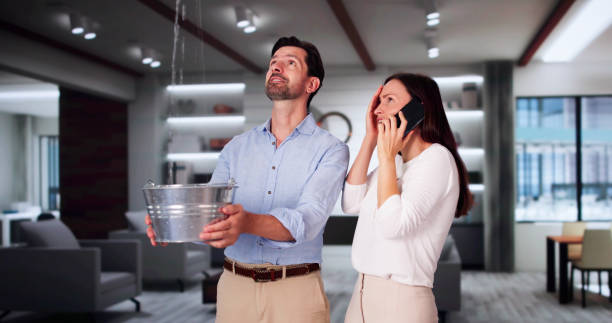 Emergency Leak Damage Water Leak Or Flood Emergency Leak Damage Water Leak Or Flood From Ceiling unusual couple stock pictures, royalty-free photos & images