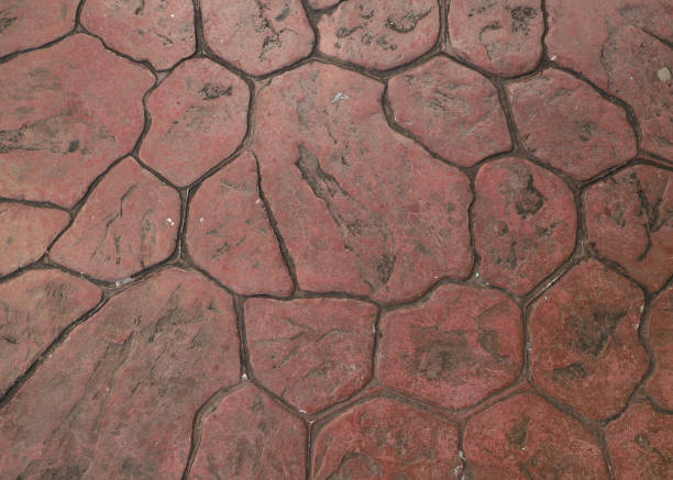 Mosaic pavement with very irregular reddish stones