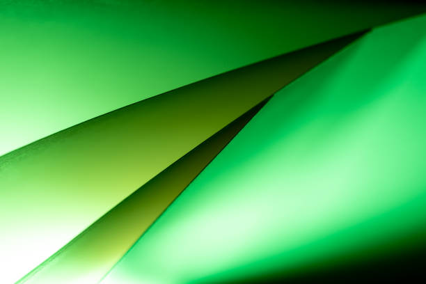 istock Colorful abstract curves in shades of green tints and black creating a dynamic visual experience 2171407908