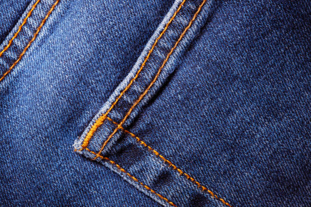 istock Texture of blue denim. Denim machine stitch. Factory tailoring. 2171411981