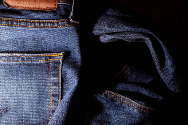 istock Texture of blue denim. Denim machine stitch. Factory tailoring. 2171413492
