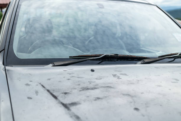 istock Close up of old car windshield rain wipers 2171418711