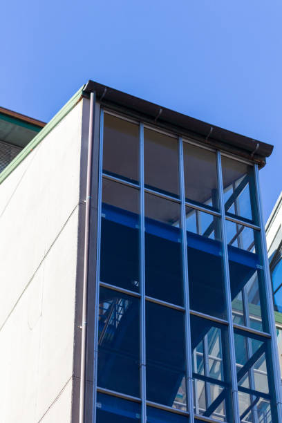 istock Modern Glass-Facade Building Corner Against Clear Sky 2171421917